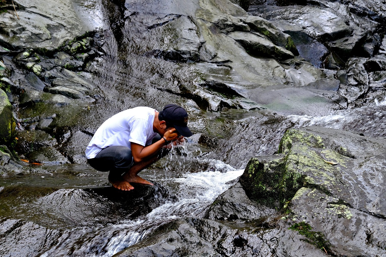 young man, washing, river, trekking, adventure, nature